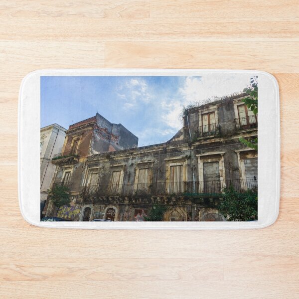 Item preview, Abandoned Historic Building With Crumbling Facade And Graffiti In Urban Street Scene designed and sold by Nmallia.
