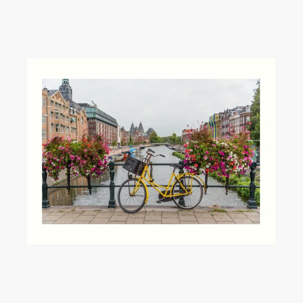 Yellow Bicycle and Flowers on a Bridge in Amsterdam Netherlands Art Print