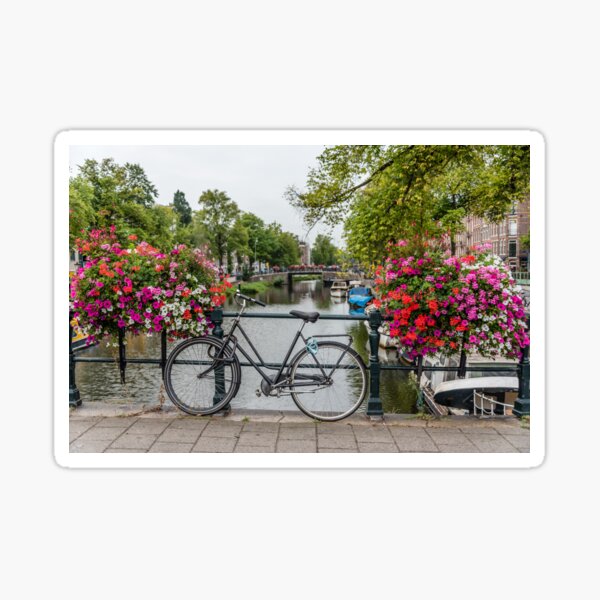 Bicycle and Flowers on a Bridge in Amsterdam Netherlands Sticker