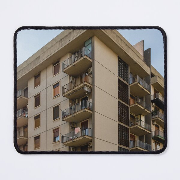 Item preview, Urban Apartment Building With Balconies Under A Clear Sky And Graffiti At Street Level designed and sold by Nmallia.