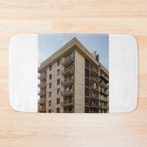 Item preview, Urban Apartment Building With Balconies Under A Clear Sky And Graffiti At Street Level designed and sold by Nmallia.