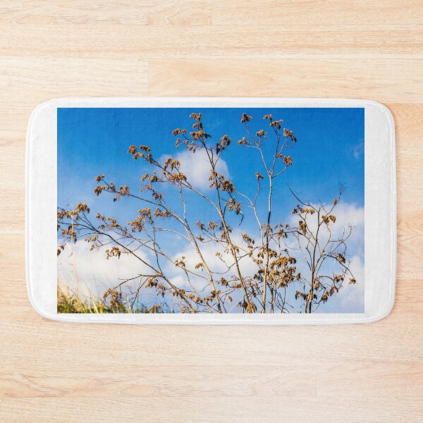Item preview, Bare Tree Branches Reaching Toward A Bright Blue Sky With Sparse Golden Leaves designed and sold by Nmallia.
