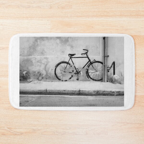 Item preview, Graffiti Bicycle Painted On Old Wall Creating Urban Street Scene In Monochrome Tones designed and sold by Nmallia.