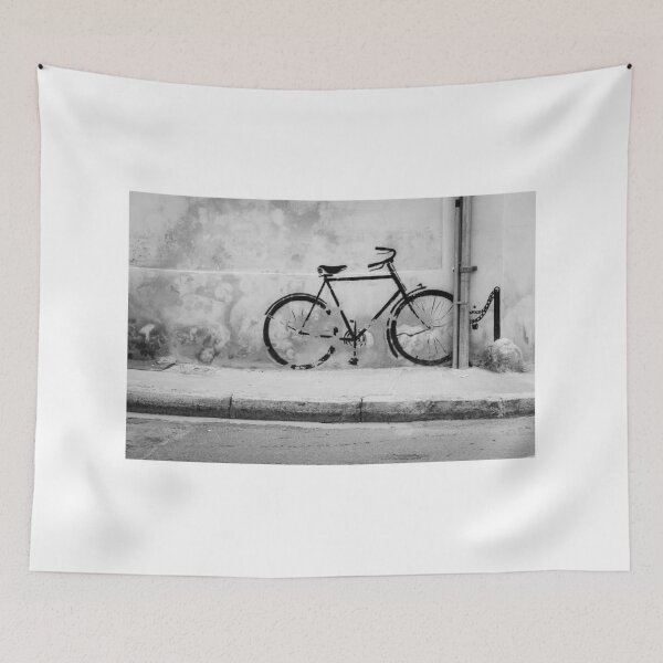 Item preview, Graffiti Bicycle Painted On Old Wall Creating Urban Street Scene In Monochrome Tones designed and sold by Nmallia.