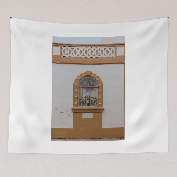 Item preview, Ornate Window Shrine With Cross, Floral Arrangements, And Rustic Tan Wall On Exterior Building designed and sold by Nmallia.
