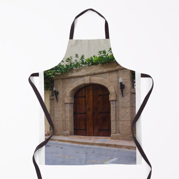 Item preview, Ancient Stone Archway With Wooden Doors And Green Vines Above A Street designed and sold by Nmallia.