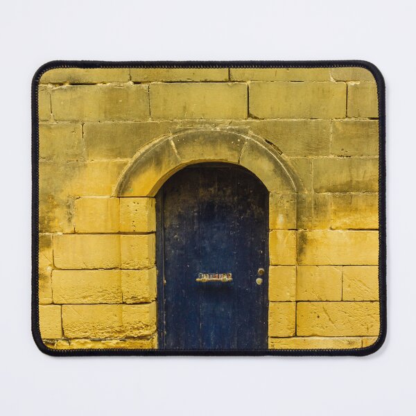 Item preview, Old Stone Wall With Arched Blue Door: Quiet Historic Entrance On Sunlit Street designed and sold by Nmallia.