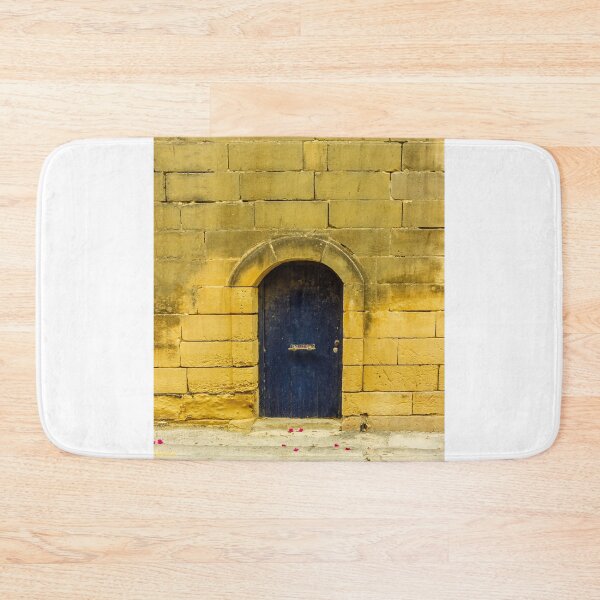 Item preview, Old Stone Wall With Arched Blue Door: Quiet Historic Entrance On Sunlit Street designed and sold by Nmallia.