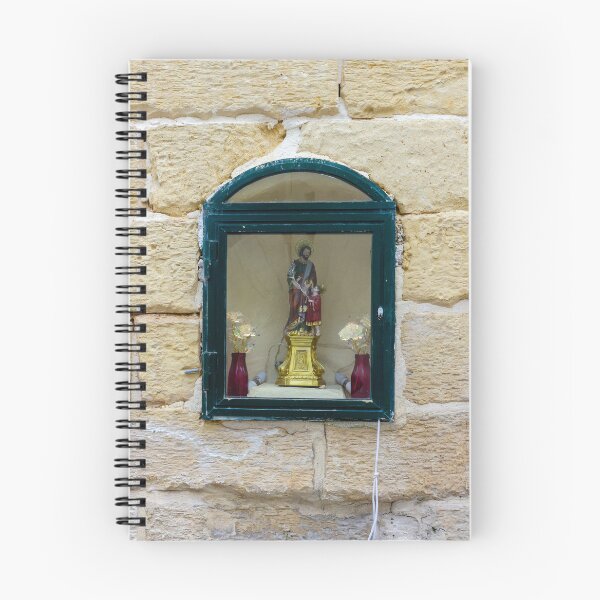 Item preview, Small Religious Shrine Displayed Behind Glass In Arched Window Set In Warm Stone Wall designed and sold by Nmallia.