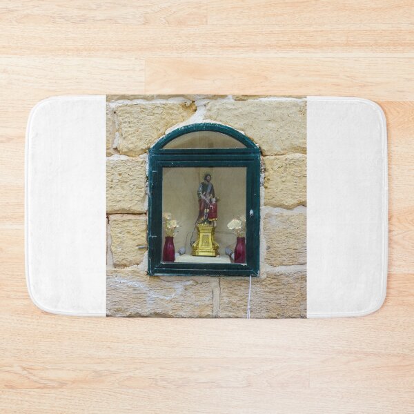 Item preview, Small Religious Shrine Displayed Behind Glass In Arched Window Set In Warm Stone Wall designed and sold by Nmallia.