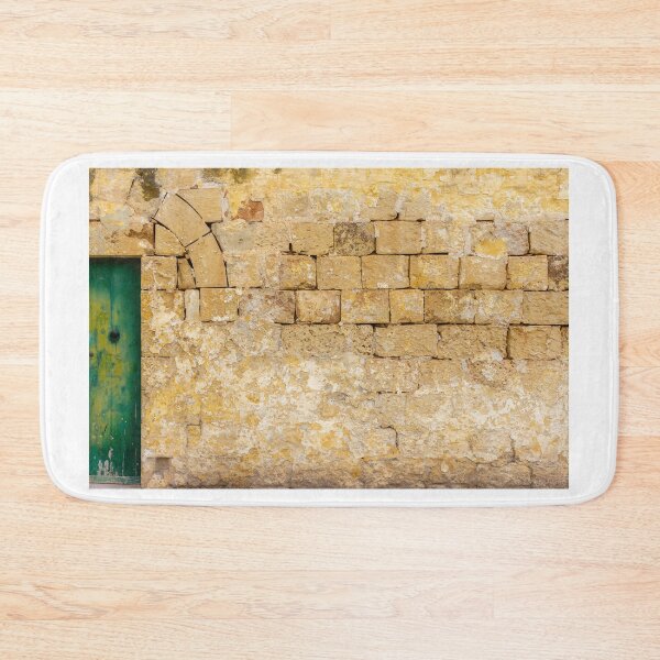 Item preview, Old Yellow Stone Wall With Green Door and Archway, Rustic Exterior Texture and Weathered Charm designed and sold by Nmallia.