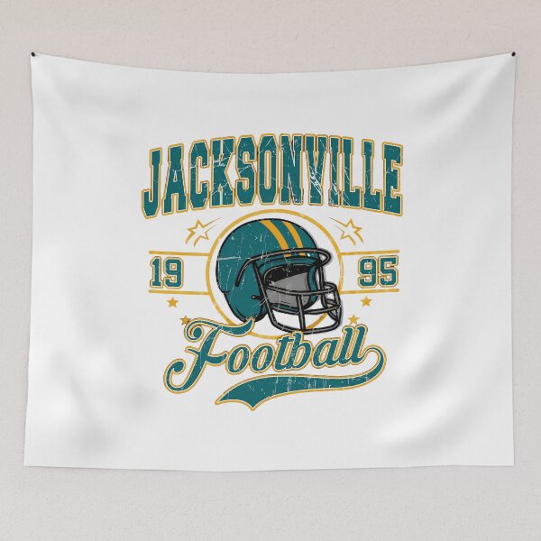 Item preview, Retro Jacksonville Football Helmet Graphic Tee designed and sold by Rowyn1998.