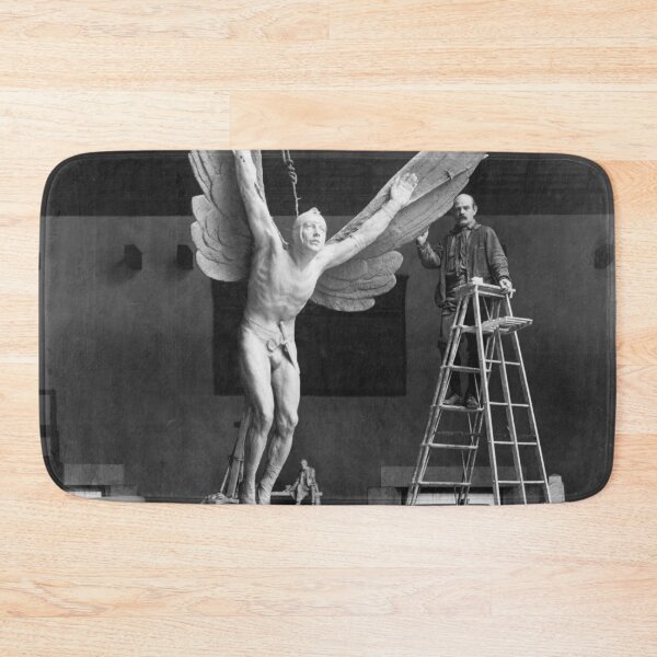 Item preview, Gutzon Borglum, sculptor, standing on ladder, alongside his sculpture, Aviator vintage black and white photograph designed and sold by Astrid Arkhangelsky.
