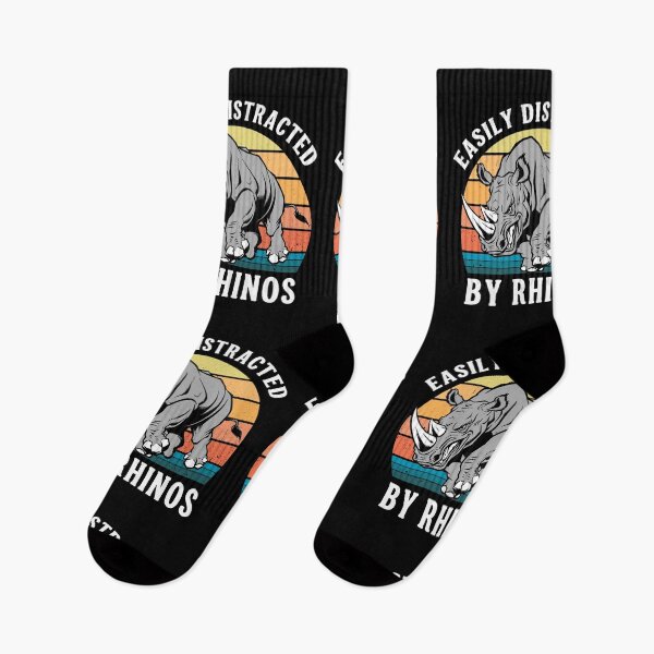 Item preview, Easily Distracted By Rhinos Retro Sunset - Funny Wildlife Art designed and sold by Dmetalx Art Apparel.