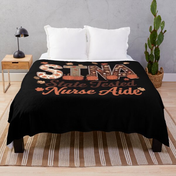 Item preview, STNA State Tested Nurse Aide Fall Autumn Pumpkins Leaves Healthcare Worker Fan Apparel designed and sold by Sendowart.