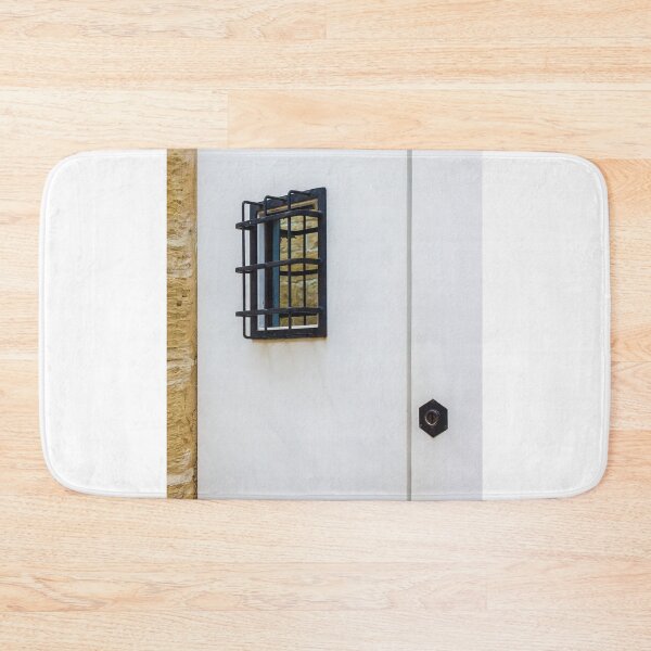 Item preview, White Door With Small Iron Grilled Window Beside Stone Wall; Quiet Exterior Architecture Detail designed and sold by Nmallia.