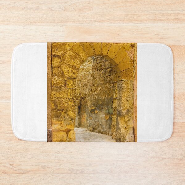 Item preview, Ancient Stone Archway Through Weathered Yellow Wall, Rustic Passage Into Old Stone Corridor designed and sold by Nmallia.