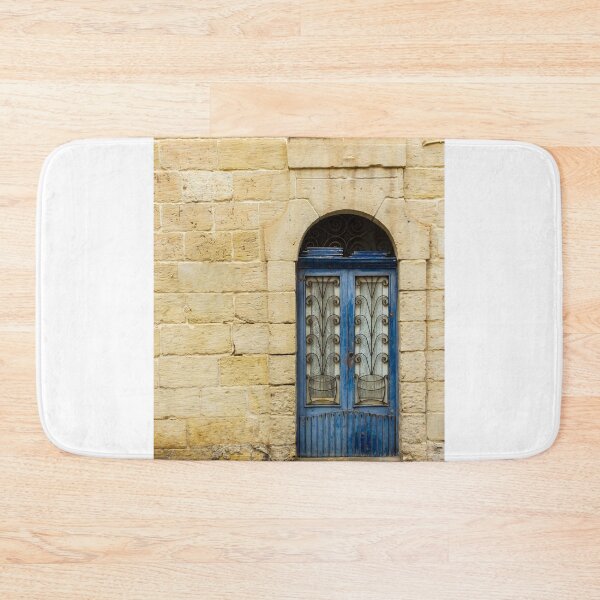 Item preview, Blue Arched Window With Intricate Iron Grille Set in Cream Stone Wall Facade designed and sold by Nmallia.