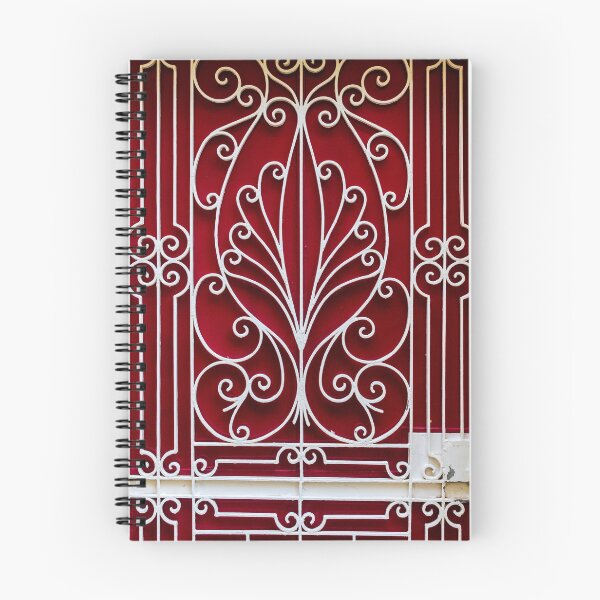 Item preview, Ornate White Iron Gate With Curved Scrollwork Against Deep Red Background Architectural Facade Decor Art designed and sold by Nmallia.