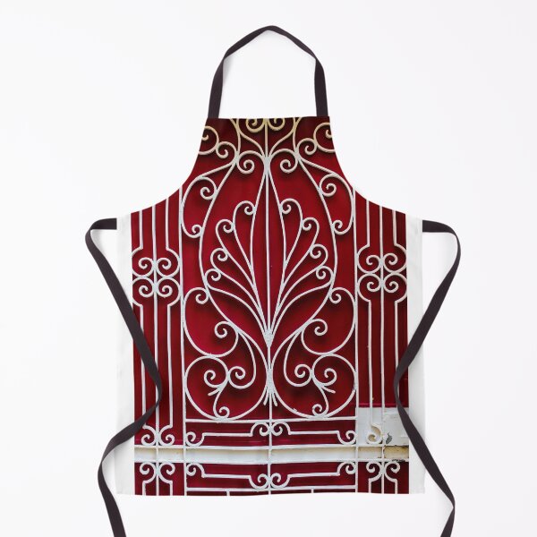 Item preview, Ornate White Iron Gate With Curved Scrollwork Against Deep Red Background Architectural Facade Decor Art designed and sold by Nmallia.