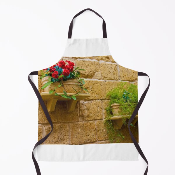 Item preview, Rustic Wall Planters With Red Geraniums And Green Trailing Plants On Stone Wall designed and sold by Nmallia.