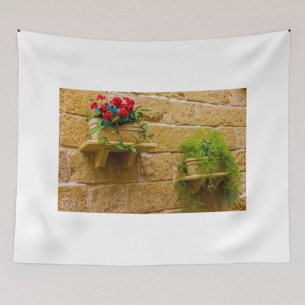 Item preview, Rustic Wall Planters With Red Geraniums And Green Trailing Plants On Stone Wall designed and sold by Nmallia.