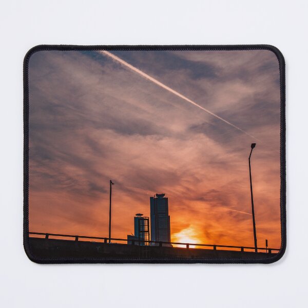 Item preview, Contrail Across Glowing Sunset Sky Above Bridge designed and sold by Nightwindow.