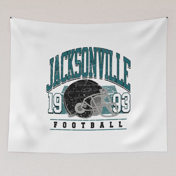 Item preview, Jacksonville Football Retro Helmet Graphic Tee designed and sold by KesarHosaka95.