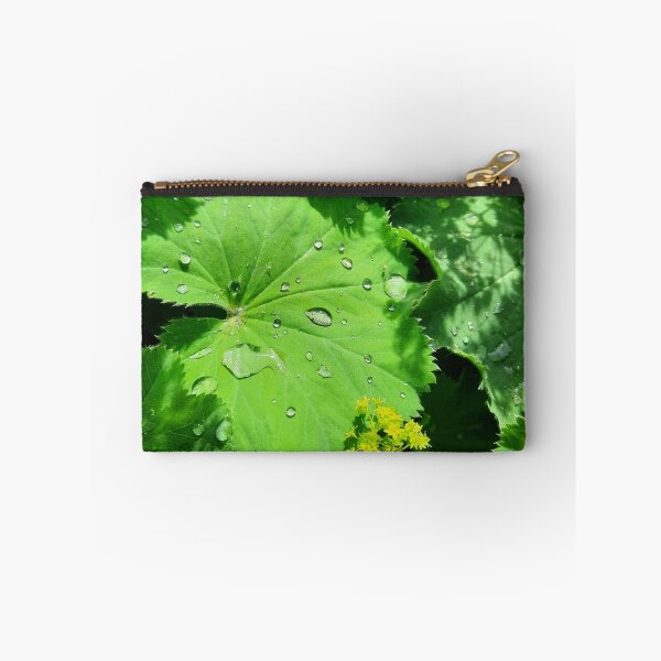Item preview, Raindrops on beautiful vibrant green leaf designed and sold by FoxPix.