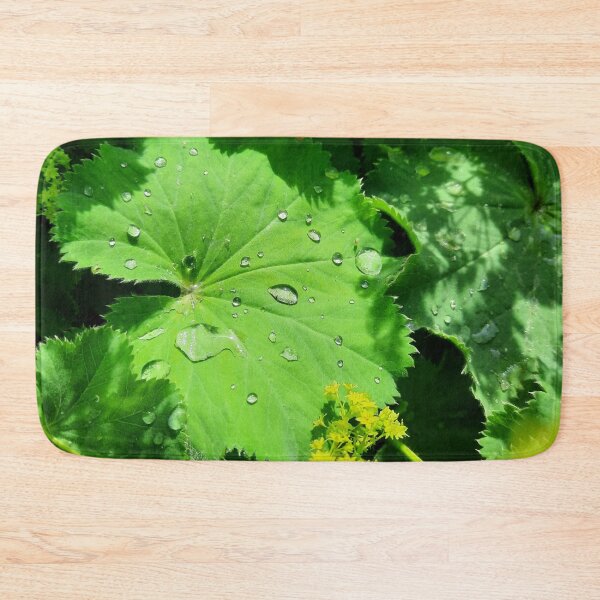 Item preview, Raindrops on beautiful vibrant green leaf designed and sold by FoxPix.