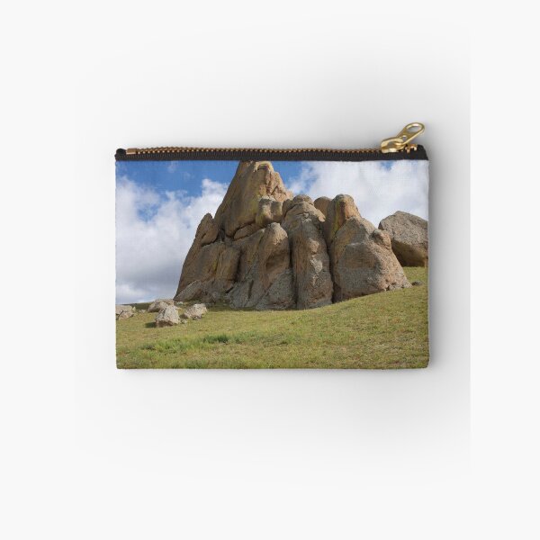 Item preview, Weathered Rock Pinnacle on a Grassy Slope Beneath Blue Sky designed and sold by seunghus.