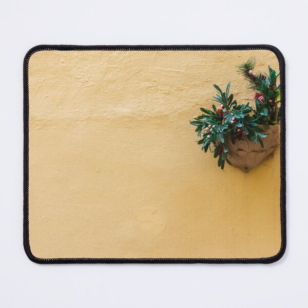Item preview, Vibrant Green Plant in a Decorative Pot on a Bright Yellow Wall designed and sold by Nmallia.