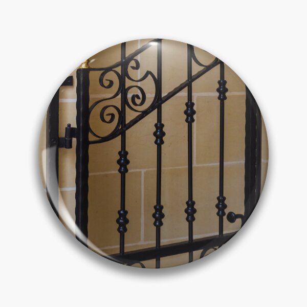 Item preview, Elegant Black Wrought Iron Gate With Gold Finials Set Against Beige Stone Wall designed and sold by Nmallia.