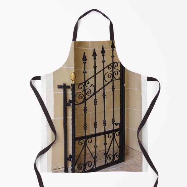 Item preview, Elegant Black Wrought Iron Gate With Gold Finials Set Against Beige Stone Wall designed and sold by Nmallia.
