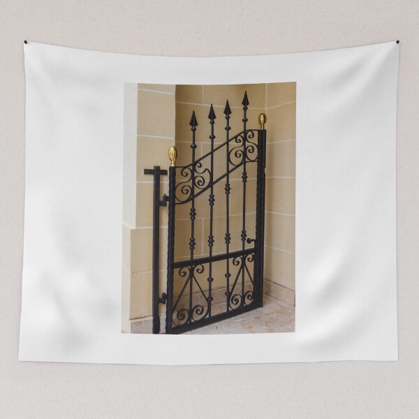 Item preview, Elegant Black Wrought Iron Gate With Gold Finials Set Against Beige Stone Wall designed and sold by Nmallia.