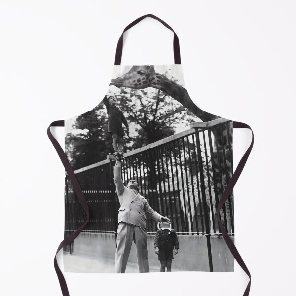 Item preview, Vintage funny A Father Helping His Son Feed A Giraffe At London Zoo black and white photographic art print designed and sold by Astrid Arkhangelsky.
