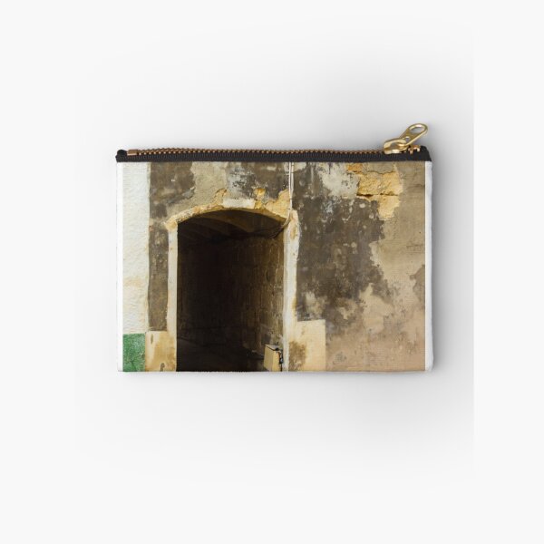 Item preview, Weathered City Wall With Arched Doorway Leading to Dark Tunnel on Worn Facade designed and sold by Nmallia.