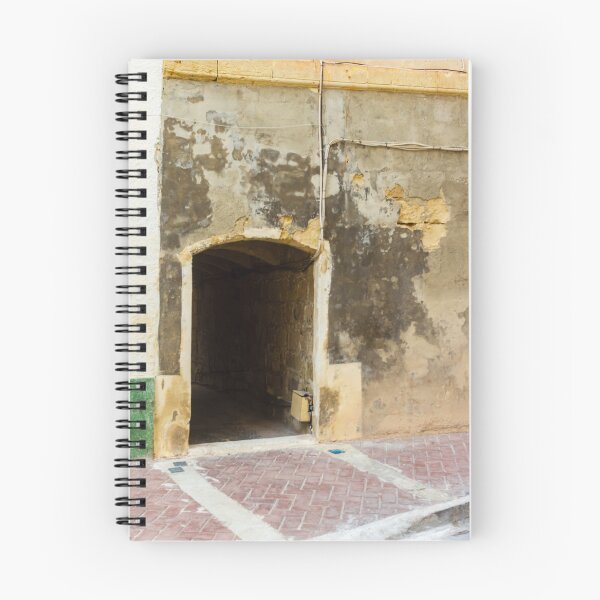 Item preview, Weathered City Wall With Arched Doorway Leading to Dark Tunnel on Worn Facade designed and sold by Nmallia.