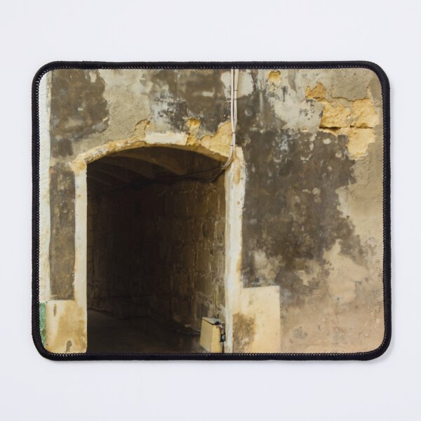 Item preview, Weathered City Wall With Arched Doorway Leading to Dark Tunnel on Worn Facade designed and sold by Nmallia.