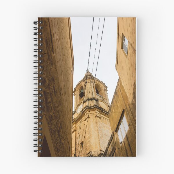 Item preview, Historic Clock Tower In Malta: Golden Stone Facade, Tall Bell Tower With Weathered Exterior designed and sold by Nmallia.
