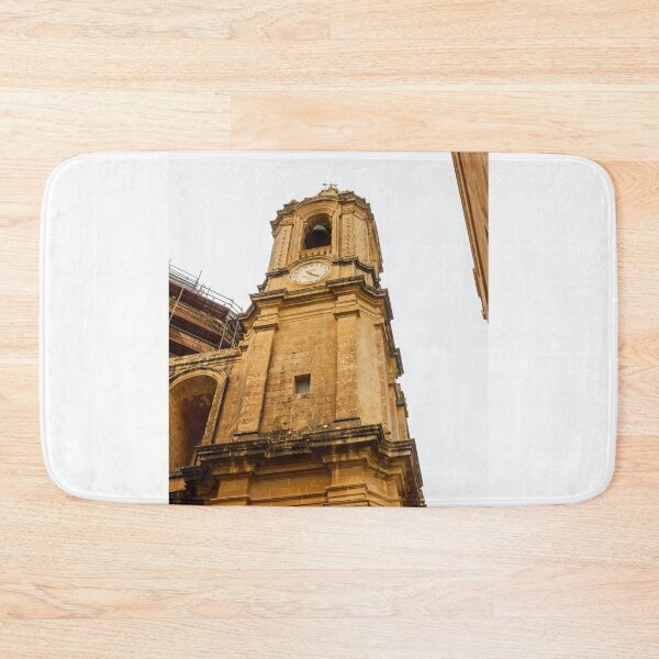Item preview, Historic Clock Tower In Malta: Golden Stone Facade, Tall Bell Tower With Weathered Exterior designed and sold by Nmallia.