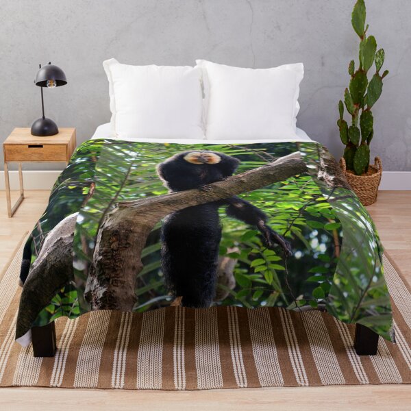 Item preview, White-Faced Saki on Tree Branch designed and sold by Savannah Gibbs.