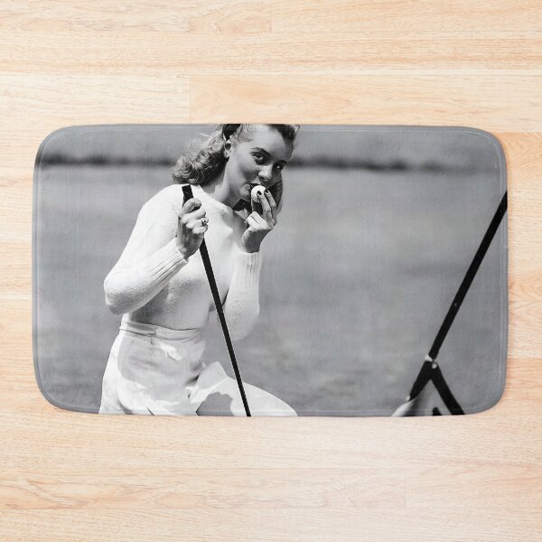 Item preview, Lips out, young woman kissing the golf ball for good luck funny humorous golfing vintage black and white photograph designed and sold by Astrid Arkhangelsky.