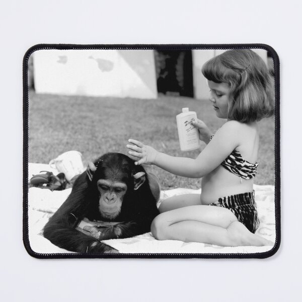 Item preview, Unlikely best friends, little girl putting suntan lotion on baby chimpanzee funny humorous vintage black and white photograph designed and sold by Astrid Arkhangelsky.