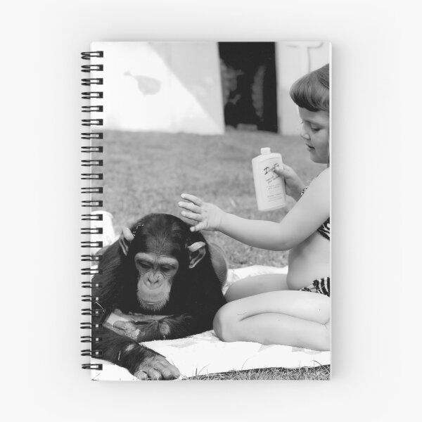 Item preview, Unlikely best friends, little girl putting suntan lotion on baby chimpanzee funny humorous vintage black and white photograph designed and sold by Astrid Arkhangelsky.