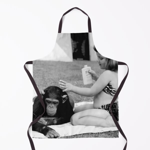 Item preview, Unlikely best friends, little girl putting suntan lotion on baby chimpanzee funny humorous vintage black and white photograph designed and sold by Astrid Arkhangelsky.