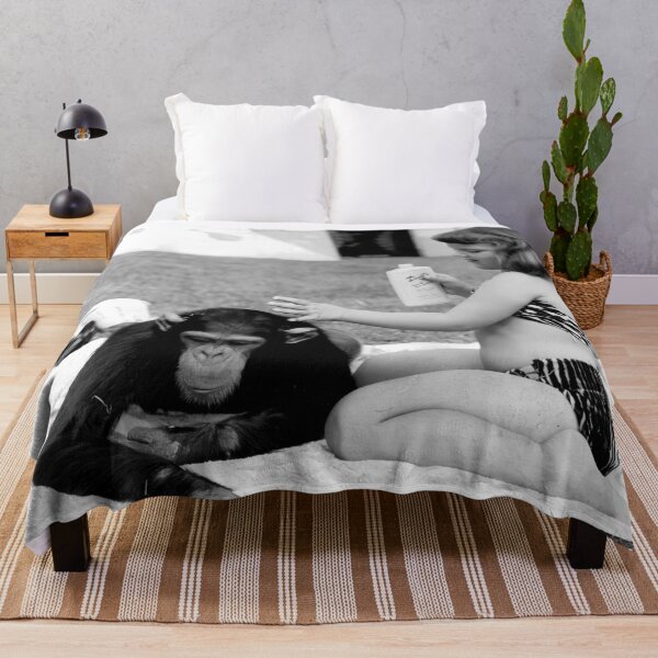Item preview, Unlikely best friends, little girl putting suntan lotion on baby chimpanzee funny humorous vintage black and white photograph designed and sold by Astrid Arkhangelsky.