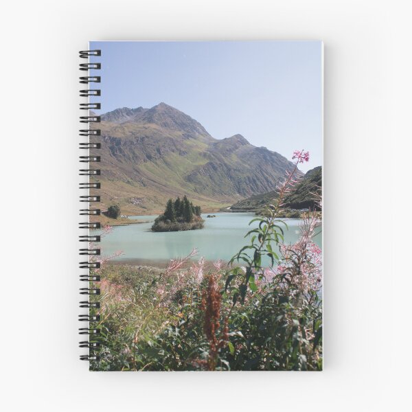 Item preview, Turquoise mountain lake behind wild alpine flowers designed and sold by rhosbahu.
