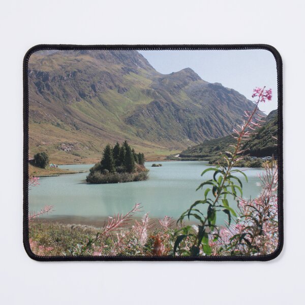 Item preview, Turquoise mountain lake behind wild alpine flowers designed and sold by rhosbahu.
