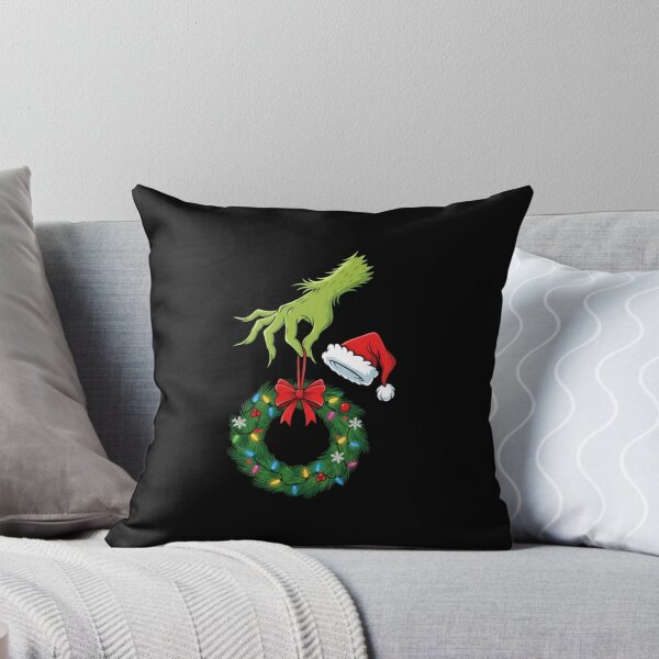 Aperçu de l'œuvre Main du Grinch tenant une couronne de Noël avec un chapeau de Père Noël créée et vendue par CalistaLueilwit.